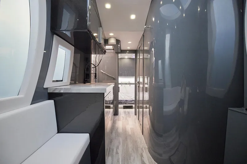 Slide: The Image of Luxurious interior of Midnight Express 52' Vitesse yacht with modern design and sleek finishes. - 18