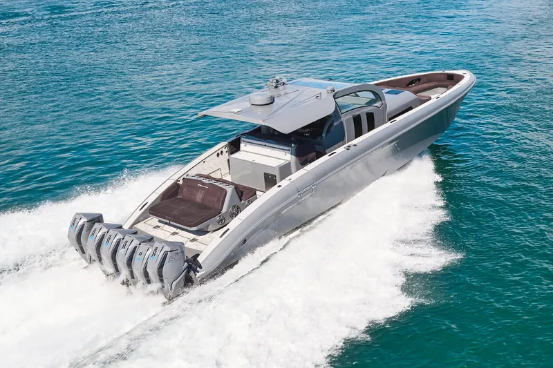 Slide: The Image of Luxury Midnight Express 52' Vitesse yacht cruising on open water, showcasing powerful engines. - 2