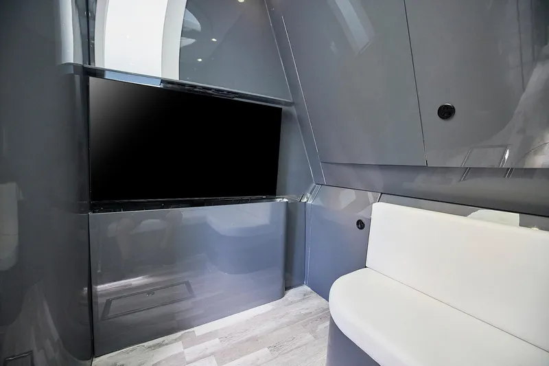 Slide: The Image of Luxurious interior of Midnight Express 52' Vitesse yacht with sleek design and modern amenities. - 21