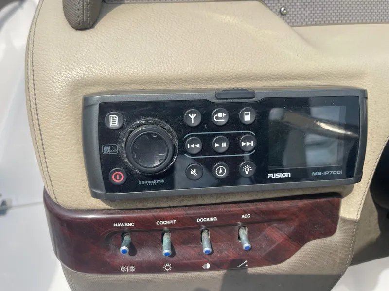 Slide: The Image of Fusion MS-IP700i stereo system on 2014 Regal 2700 Bowrider boat dashboard. - 16