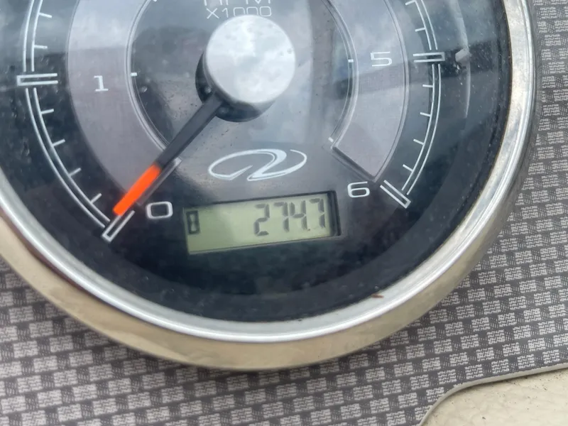 Slide: The Image of Close-up of 2014 Regal 2700 Bowrider tachometer displaying 274.7 hours. - 20
