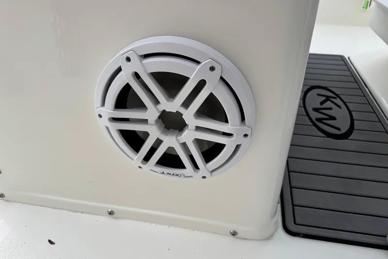 Slide: The Image of 2026 Key West 263 FS boat with JL Audio speaker and KW logo mat. - 18