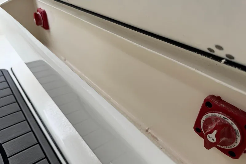 Slide: The Image of Close-up of 2026 Key West 263 FS boat interior with red control switches. - 19