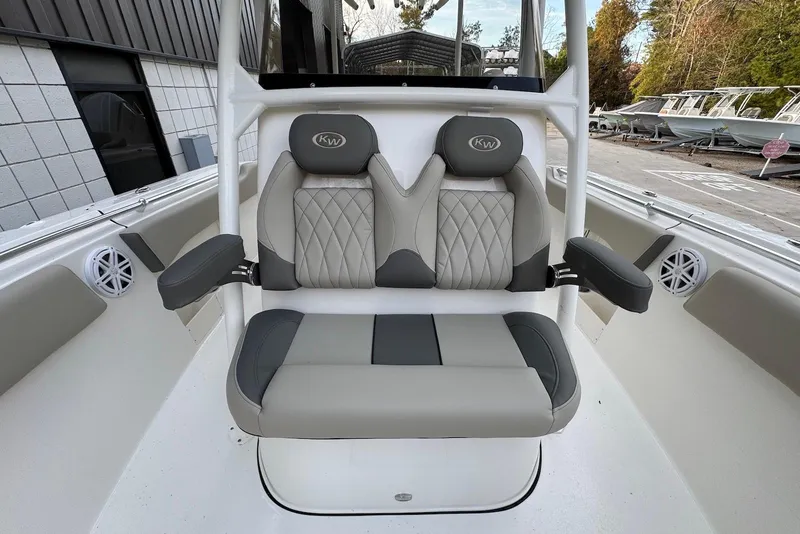 Slide: The Image of 2026 Key West 263 FS boat interior with stylish seating and armrests. - 24