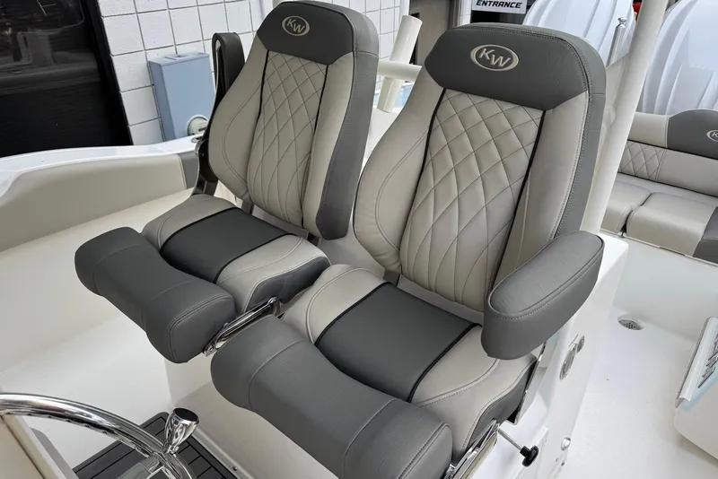 Slide: The Image of Luxury seating on 2026 Key West 263 FS boat, featuring quilted upholstery and ergonomic design. - 31