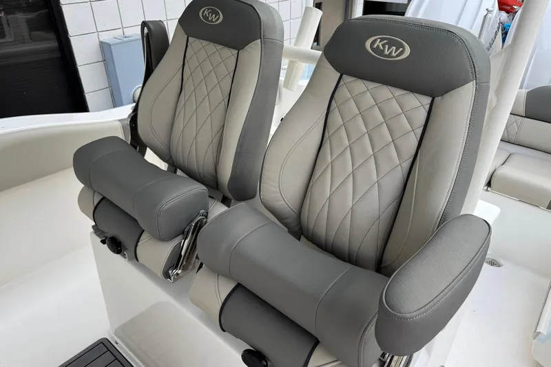 Slide: The Image of Luxury seating on 2026 Key West 263 FS boat, featuring elegant gray upholstery. - 32