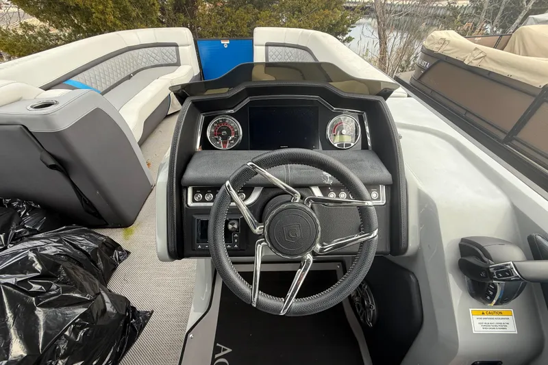 Slide: The Image of 2023 Godfrey AquaPatio 255 ULC pontoon boat with luxurious seating and modern design. - 19