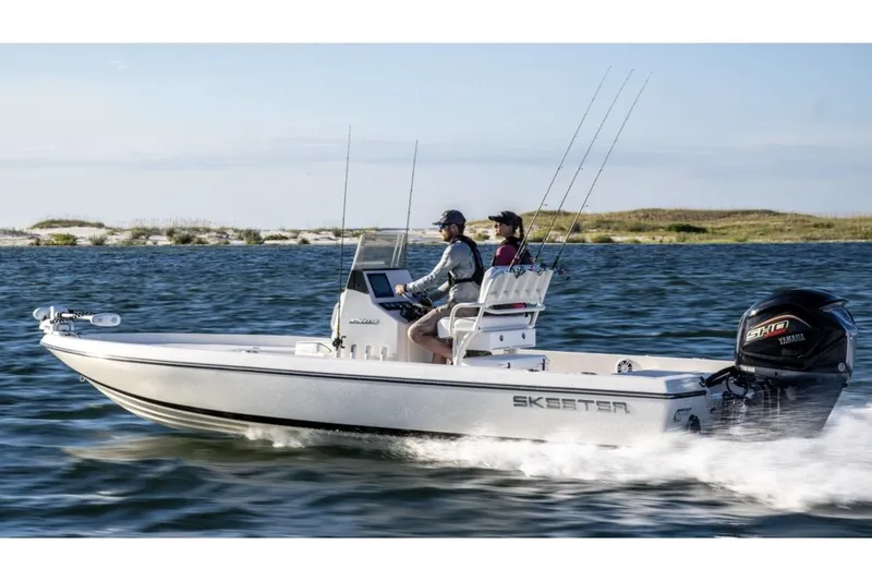 The Image of Manufacturer Provided Image: 2026 Skeeter SX230 boat cruising on open water with two passengers. - 0