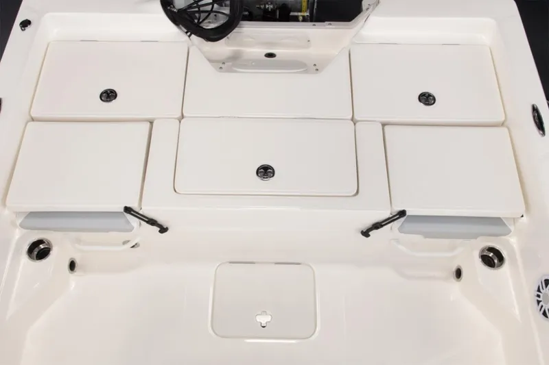 Slide: The Image of Manufacturer Provided Image: 2026 Skeeter SX230 boat deck with storage compartments and seating. - 12