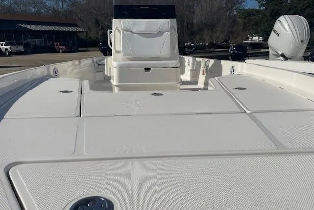 Slide: The Image of 2026 Skeeter SX230 boat deck with seating and storage compartments. - 16