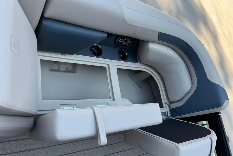 Slide: The Image of 2026 Godfrey SWEETWATER 2286 SFL boat interior seating and storage compartments. - 12