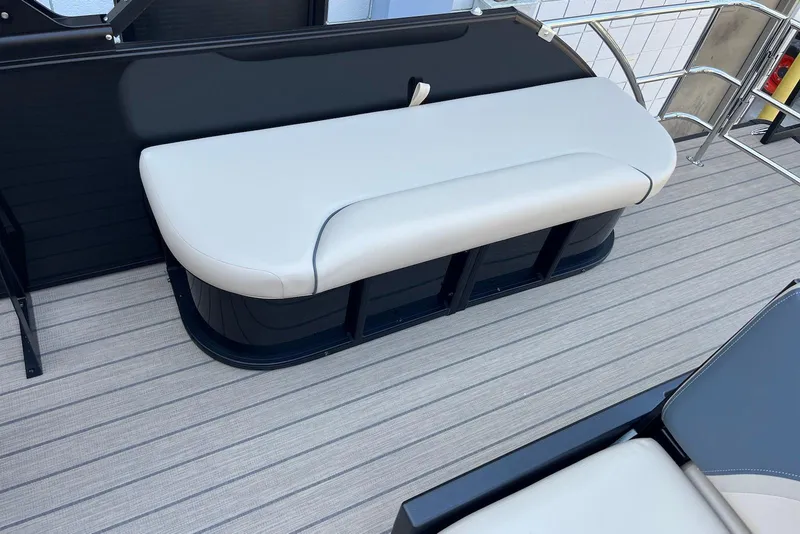 Slide: The Image of 2026 Godfrey SWEETWATER 2286 SFL boat interior with sleek seating and modern design. - 21