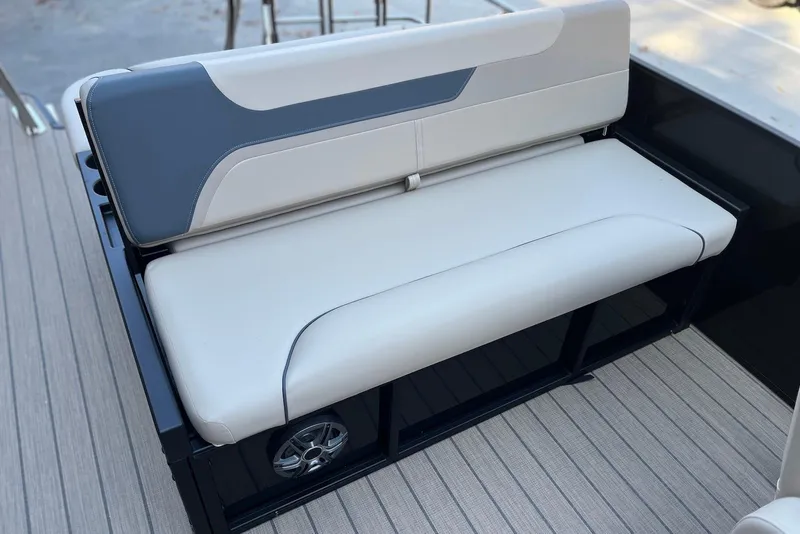 Slide: The Image of 2026 Godfrey SWEETWATER 2286 SFL boat seat with modern design and speaker. - 23