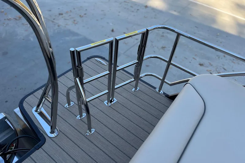 Slide: The Image of 2026 Godfrey SWEETWATER 2286 SFL boat deck with stainless steel railings. - 27