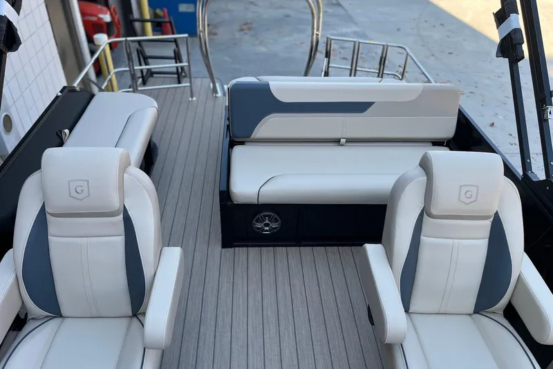 Slide: The Image of 2026 Godfrey SWEETWATER 2286 SFL boat interior with stylish seating and modern design. - 33