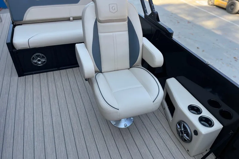 Slide: The Image of Luxurious seating on 2026 Godfrey SWEETWATER 2286 SFL boat with cup holders and speaker. - 35