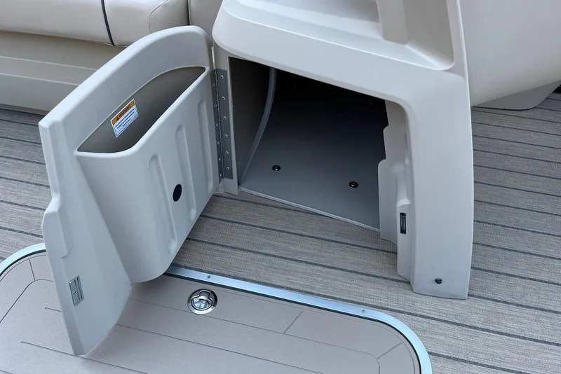 Slide: The Image of Open storage compartment on 2026 Godfrey SWEETWATER 2286 SFL boat deck. - 37