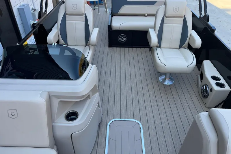 Slide: The Image of Luxurious interior of 2026 Godfrey SWEETWATER 2286 SFL pontoon boat with plush seating. - 9