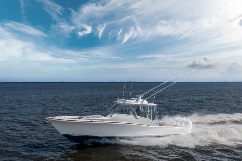 The Image of 2026 Albemarle 45 Carolinian cruising on open water under a partly cloudy sky. - 1