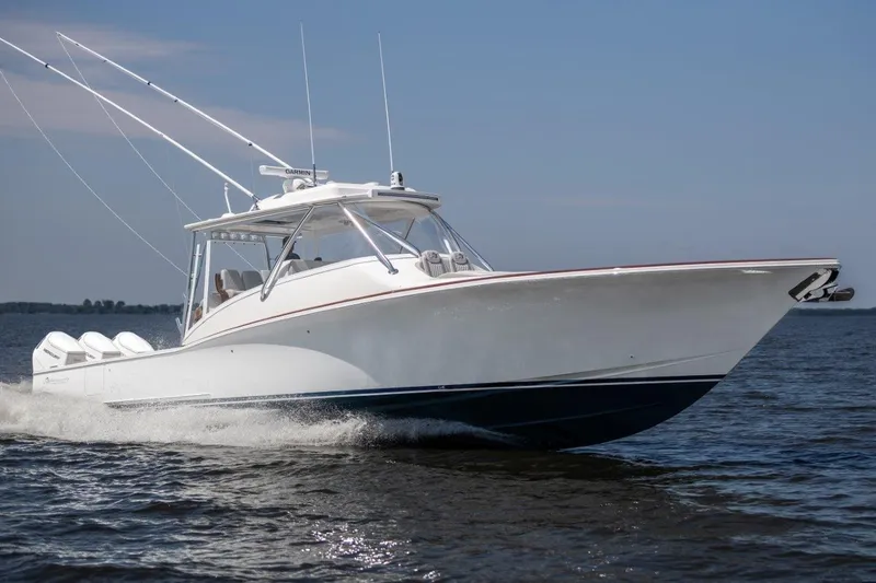 Slide: The Image of 2026 Albemarle 45 Carolinian boat cruising on open water. - 5