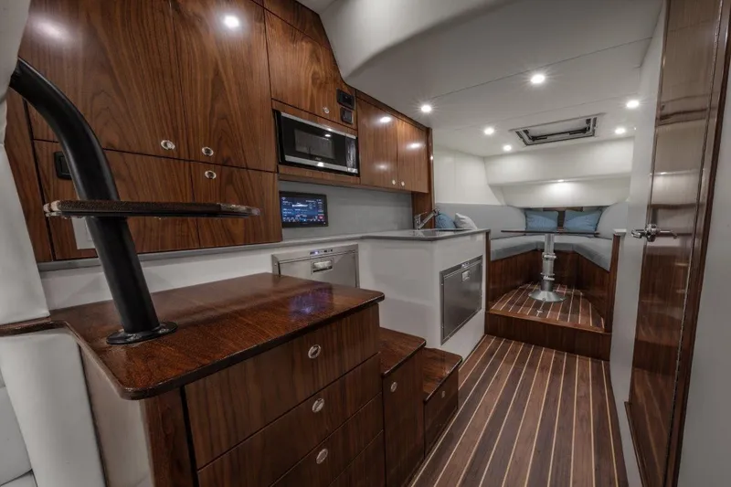 Slide: The Image of Luxurious interior of 2026 Albemarle 45 Carolinian yacht with wood finishes and modern amenities. - 7