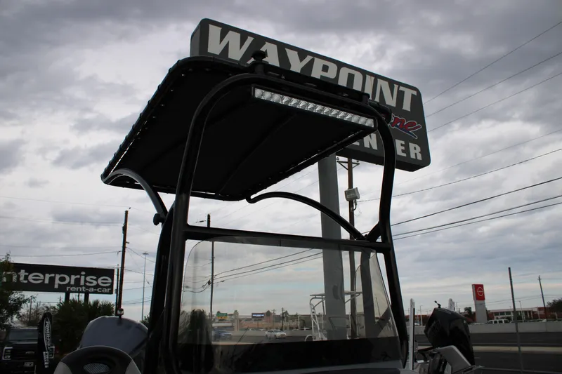 Slide: The Image of 2017 Blazer 2420 boat under cloudy sky at Waypoint Center. - 18