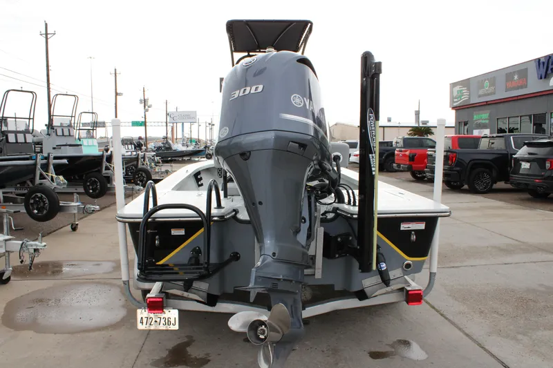 Slide: The Image of 2017 Blazer 2420 boat with Yamaha 300 engine at dealership lot. - 4