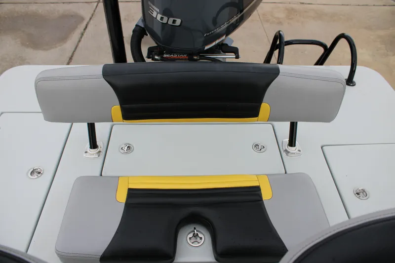 Slide: The Image of 2017 Blazer 2420 boat seating with Yamaha 300 engine, featuring black and yellow accents. - 11