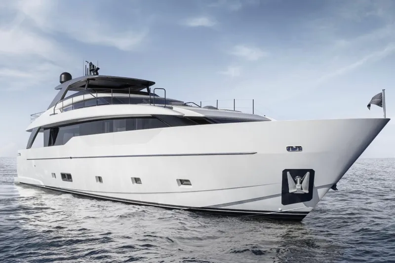 Slide: The Image of 2025 Sanlorenzo SL90A luxury yacht cruising on open water. - 1