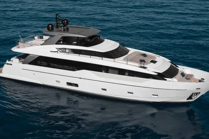 Slide: The Image of 2025 Sanlorenzo SL90A luxury yacht cruising on open sea. - 2