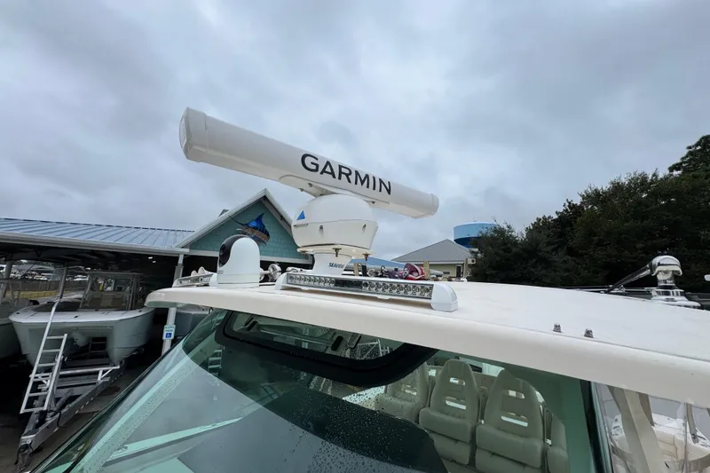 Slide: The Image of 2024 Grady-White Canyon 386 boat with Garmin radar system on top. - 29