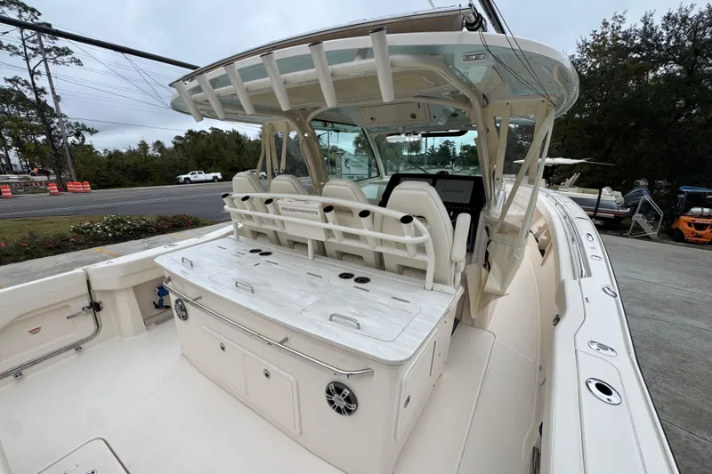 Slide: The Image of 2024 Grady-White Canyon 386 boat interior with seating and helm station. - 56