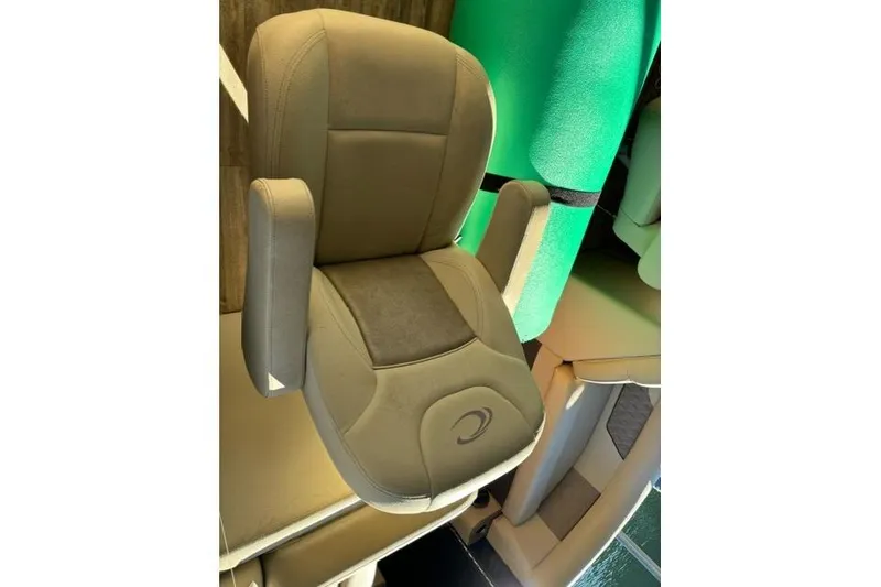 Slide: The Image of 2019 Crest 220 CREST II boat seat with armrests, beige upholstery. - 7