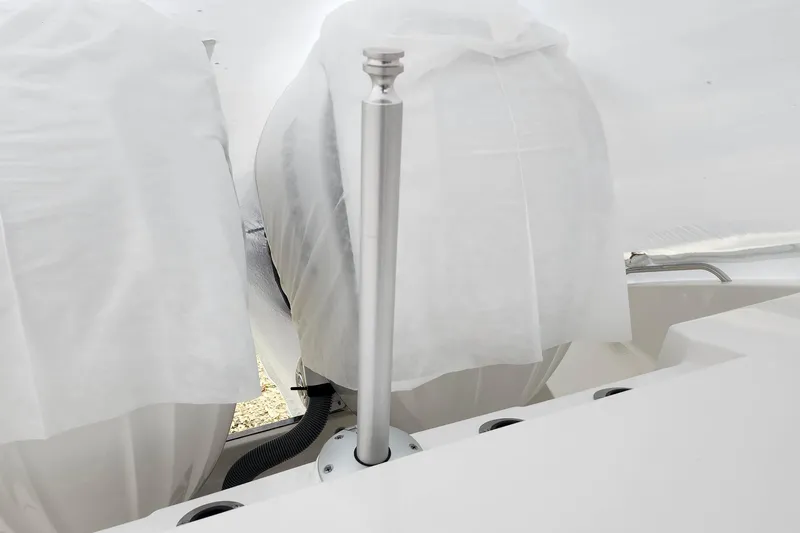 Slide: The Image of Manufacturer Provided Image: 2026 Pursuit S 288 Sport boat cruising on clear blue ocean waters. - 2