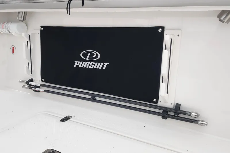 Slide: The Image of 2026 Pursuit S 288 Sport boat interior with cushioned seating and sleek design. - 20