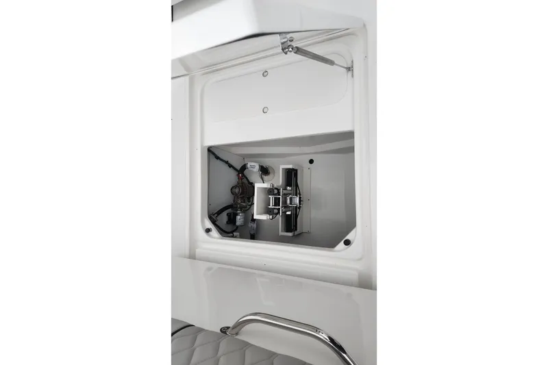 Slide: The Image of 2026 Pursuit S 288 Sport boat interior with elegant seating and storage. - 9