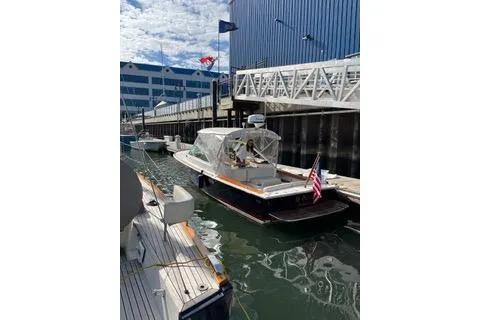 The Image of 2007 Hunt Yachts Harrier 25 on stands in a workshop. - 0