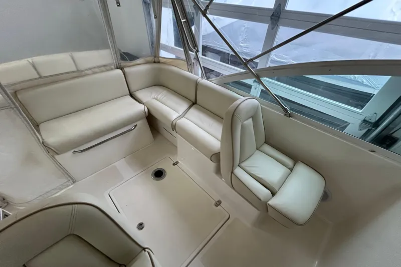 Slide: The Image of 2007 Hunt Yachts Harrier 25 interior with cream leather seating and modern design. - 18