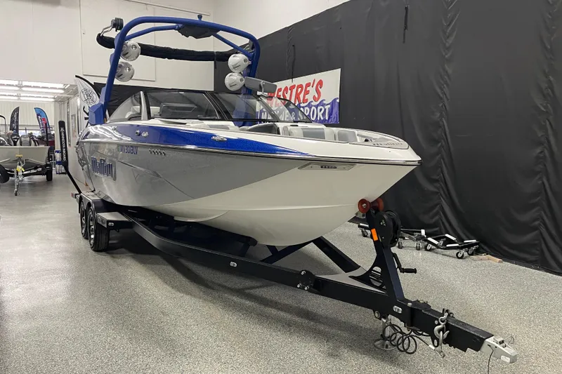 The Image of 2019 Malibu Wakesetter 25 LSV boat on trailer in showroom. - 0