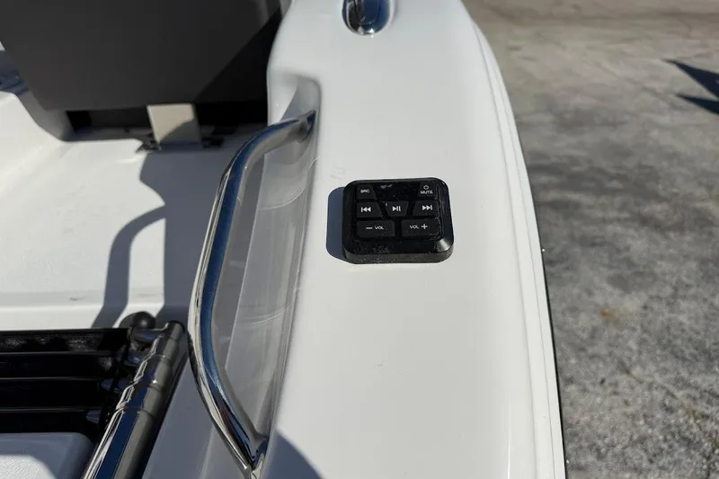 Slide: The Image of Control panel on 2026 Sea Pro 245FLX Sandbar boat deck. - 11