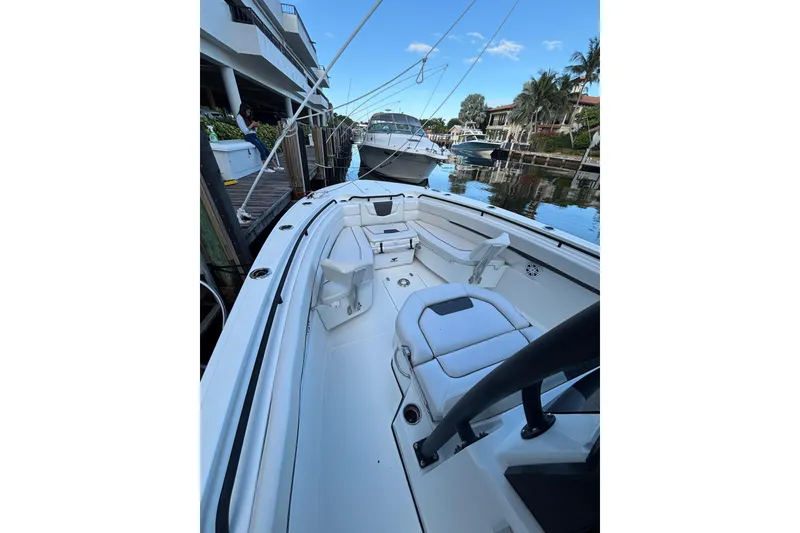 Slide: The Image of 2021 Wellcraft 302 Scarab storage compartment with coiled rope inside. - 14