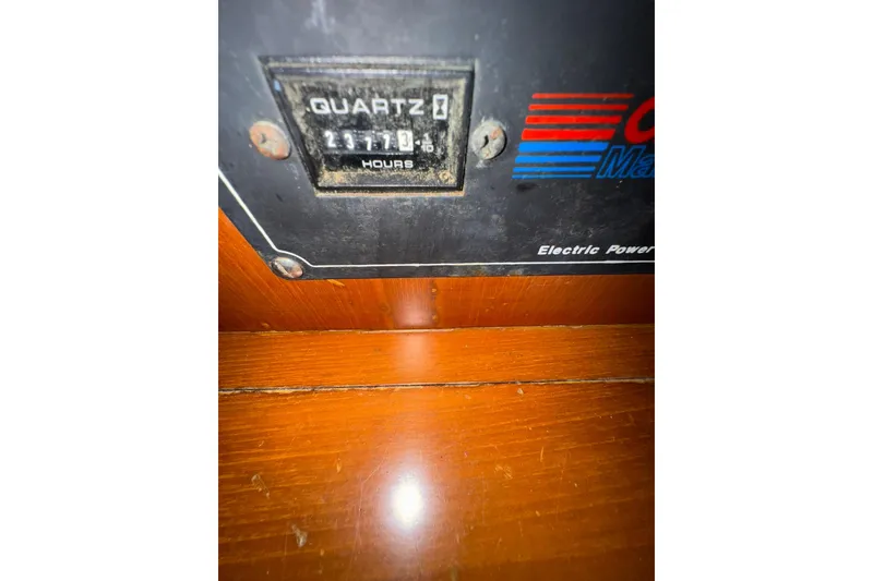 Slide: The Image of Hour meter reading 2377.3 on a 1991 DeFever 44 boat panel. - 48