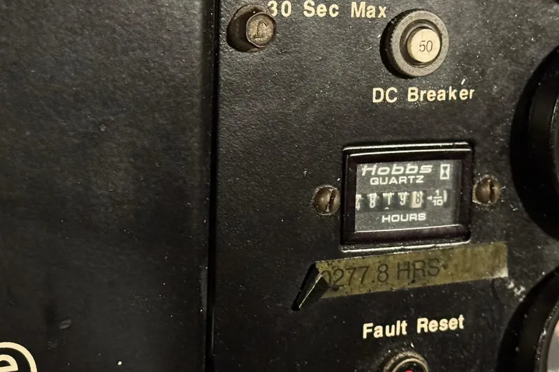 Slide: The Image of Hour meter on 1991 DeFever 44 boat, showing 8779.8 hours. - 73