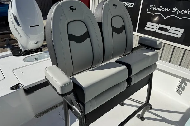 Slide: The Image of 2026 Sea Pro 250 Bay boat seats with armrests, featuring sleek design and comfort. - 15