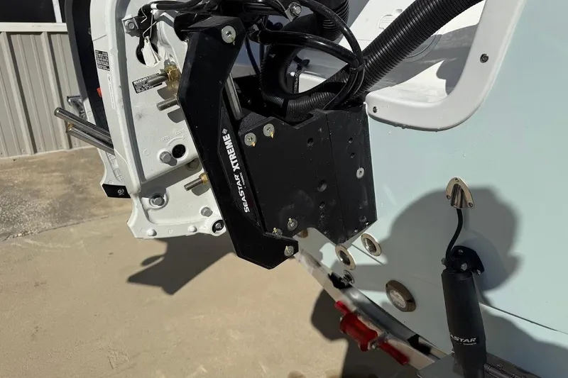 Slide: The Image of 2026 Sea Pro 250 Bay boat with SeaStar Xtreme steering system, close-up view. - 7