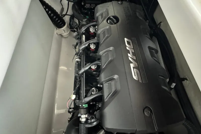 Slide: The Image of 2024 Yamaha Boats 275SD engine compartment showcasing SVHO engine components. - 17