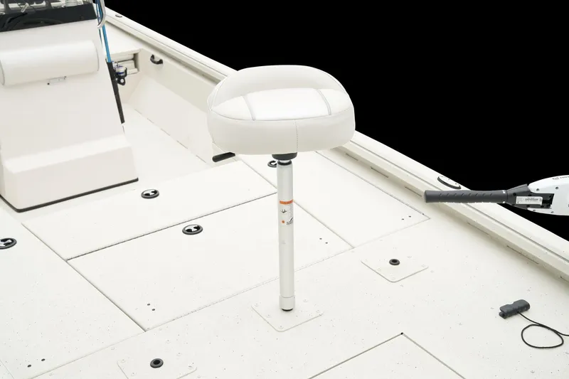Slide: The Image of Manufacturer Provided Image: Manufacturer Provided Image: 2025 Ranger RB210 boat deck with white seat and storage compartments. - 24