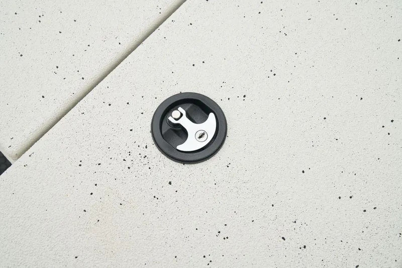 Slide: The Image of Manufacturer Provided Image: Manufacturer Provided Image: Ranger RB210 2025 boat deck with circular latch detail. - 27