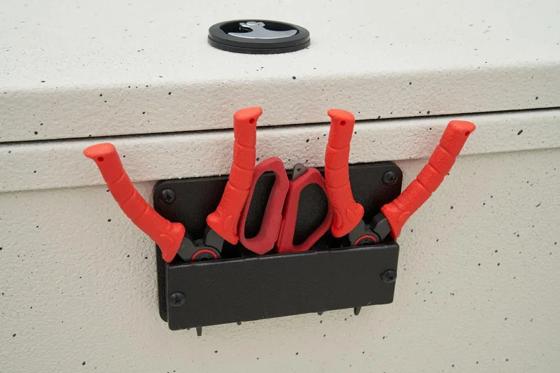 Slide: The Image of Manufacturer Provided Image: Manufacturer Provided Image: Red-handled tools on Ranger RB210, 2025 model, mounted on a speckled surface. - 29