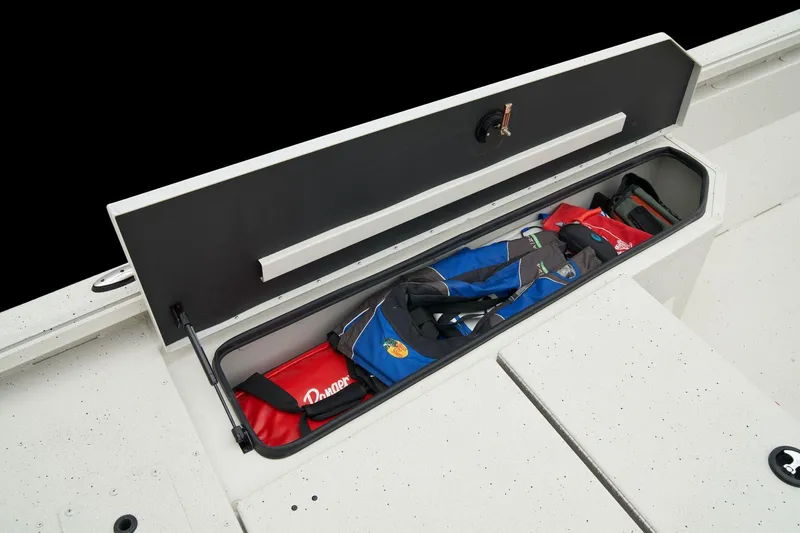 Slide: The Image of Manufacturer Provided Image: Manufacturer Provided Image: 2025 Ranger RB210 boat storage compartment with life jackets and gear. - 32